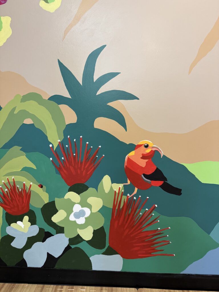 'I'iwi bird, ohia tree and other native flora and fauna in a maui inspired mural